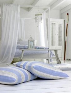 20 striped-floor-pillows-in-a-scandinavian-decorated-bedroom